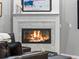 Fireplace with white mantel and beautiful tile surround, ready for cozy evenings at 425 Steele St, Denver, CO 80206
