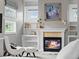 Close up of the fireplace in the main bedroom with surrounding shelves at 425 Steele St, Denver, CO 80206