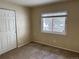 Comfortable bedroom with large windows offering plenty of natural light and a closet at 2594 S Rifle St, Aurora, CO 80013