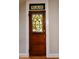 Close-up of an elegant door with stained glass at 1034 N Logan St # 2W, Denver, CO 80203