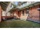 View of the red brick exterior and outdoor space of the property at 1034 N Logan St # 2W, Denver, CO 80203