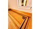 Close up of a hardwood floor with custom trim work and a beautiful design at 1034 N Logan St # 2W, Denver, CO 80203
