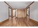 Hallway with doors to different rooms showcasing the home's floor plan at 1034 N Logan St # 2W, Denver, CO 80203