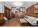 Spacious living room featuring beautiful hardwood floors, detailed trim, and a neutral color palette at 1034 N Logan St # 2W, Denver, CO 80203