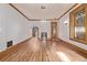 Bright living space boasting hardwood floors, bar area, and decorative window at 1034 N Logan St # 2W, Denver, CO 80203