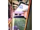 Private outdoor space with synthetic grass and view of the unique exterior at 1034 N Logan St # 2W, Denver, CO 80203
