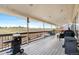 Large, covered back patio provides views of the neighborhood and ample space for grilling at 5090 Golden Valley Trl, Castle Rock, CO 80109