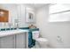 Modern bathroom with stylish fixtures, updated toilet, and decorative wall accents at 5090 Golden Valley Trl, Castle Rock, CO 80109