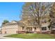 Charming home with a covered entry and a neatly maintained lawn at 5090 Golden Valley Trl, Castle Rock, CO 80109