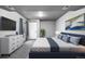 Modern main bedroom with blue accent wall, and bright natural light, complemented by stylish decor at 5090 Golden Valley Trl, Castle Rock, CO 80109