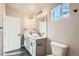 Elegant bathroom with double vanity, modern fixtures, and a sleek design at 2187 S Fox St, Denver, CO 80223