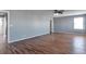 Bedroom with light gray walls, hardwood floors, ceiling fan and one window at 11069 York St, Northglenn, CO 80233