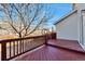Outdoor wooden deck with wood railings at 11069 York St, Northglenn, CO 80233