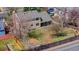 Aerial view of home with backyard, covered patio, and fenced in lot at 5556 S Sedalia St, Centennial, CO 80015