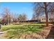 View of spacious backyard with tiered wooden garden beds at 5556 S Sedalia St, Centennial, CO 80015