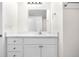 Bright bathroom with a modern vanity, ample storage, and a large mirror at 5556 S Sedalia St, Centennial, CO 80015