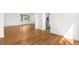 Unfurnished living room featuring lustrous hardwood floors and a window at 5556 S Sedalia St, Centennial, CO 80015