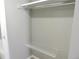 A storage closet with shelving and ample space for organizing belongings at 9887 E Peakview Ave # F06, Englewood, CO 80111