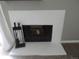 Charming white-painted brick fireplace, perfect for cozy evenings at 9887 E Peakview Ave # F06, Englewood, CO 80111