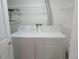 A well-equipped laundry room with a full-size washer and dryer ready for use at 9887 E Peakview Ave # F06, Englewood, CO 80111