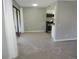 Open layout connects the living area, kitchen, and balcony for modern living at 9887 E Peakview Ave # F06, Englewood, CO 80111
