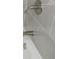 Close up of the shower hardware featuring a silver shower head with stylish trim at 9887 E Peakview Ave # F06, Englewood, CO 80111