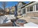 Backyard featuring a patio area, outdoor seating, and partial fencing at 10935 Valleybrook Cir, Highlands Ranch, CO 80130