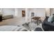 Finished basement area with a comfortable seating area, bar, and bedroom at 6863 S Detroit Cir, Centennial, CO 80122