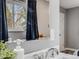 Bathroom detail featuring vanity, mirror, and natural light from the window at 6863 S Detroit Cir, Centennial, CO 80122