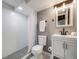 Clean bathroom with a walk-in shower and modern vanity and fixture at 6863 S Detroit Cir, Centennial, CO 80122