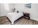 Bright bedroom with hardwood floors and beach themed decoration at 6863 S Detroit Cir, Centennial, CO 80122