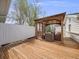 Expansive deck with a charming gazebo, perfect for outdoor entertaining and enjoying the surrounding scenery at 6863 S Detroit Cir, Centennial, CO 80122