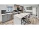 Bright kitchen with white countertops, gray cabinets, and stainless steel appliances at 6863 S Detroit Cir, Centennial, CO 80122