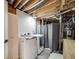 Functional laundry room with modern washer and dryer at 6863 S Detroit Cir, Centennial, CO 80122