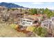 Aerial view of the home showcasing mature landscaping and backyard entertainment area at 3380 Longwood Ave, Boulder, CO 80305