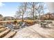 Private backyard features a fire pit, outdoor seating, built-in grill, and ample space for entertaining at 3380 Longwood Ave, Boulder, CO 80305