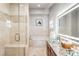 Luxurious bathroom with glass shower, soaking tub, and modern vanity with decorative glass bowl sink at 3380 Longwood Ave, Boulder, CO 80305