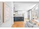 Bright, airy open concept kitchen featuring an island with stool seating and abundant natural light at 3380 Longwood Ave, Boulder, CO 80305