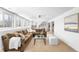 Spacious living area with modern decor, white walls, and cozy seating at 3380 Longwood Ave, Boulder, CO 80305