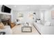 Serene living room with a fireplace, plush seating, and neutral color palette for a cozy, inviting atmosphere at 3380 Longwood Ave, Boulder, CO 80305