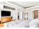 Bright open main bedroom with hardwood floors, and ensuite bathroom and views of backyard at 3380 Longwood Ave, Boulder, CO 80305