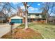 Charming two-story home with a spacious yard and a two-car garage at 6431 W Arbor Ave, Littleton, CO 80123