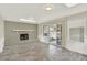 Bright living room with fireplace and sliding glass doors leading to the backyard at 6431 W Arbor Ave, Littleton, CO 80123