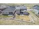 Aerial view features a large backyard, surrounded by a white fence, offering privacy and ample space at 5736 Cadara Way, Parker, CO 80134