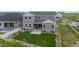 Expansive backyard with a manicured lawn, and patio area, perfect for outdoor entertaining at 5736 Cadara Way, Parker, CO 80134