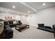 Relaxing finished basement with cozy seating area and bar with cabinets, perfect for hosting gatherings at 5736 Cadara Way, Parker, CO 80134