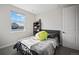 Cozy bedroom with ample natural light, window views, and a comfortable bed perfect for relaxation at 5736 Cadara Way, Parker, CO 80134