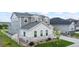 Attractive two-story home boasting modern siding, stone accents, and a well-kept lawn at 5736 Cadara Way, Parker, CO 80134