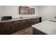 Spacious kitchen featuring granite countertops, wood cabinets and stainless steel appliances at 5736 Cadara Way, Parker, CO 80134