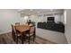 Open concept living room with dining area, office area, and comfortable seating at 5736 Cadara Way, Parker, CO 80134